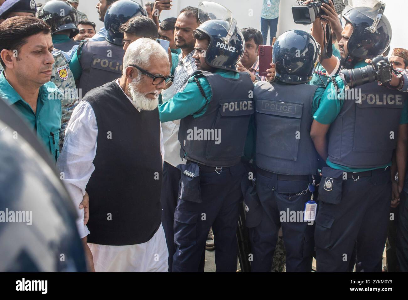 Dhaka, Bangladesh. 18th Nov, 2024. Bangladesh's former prime minister Sheikh Hasina's Former private industry affairs adviser to the former prime minister, Salman F Rahman (C) is taken to the International Crimes Tribunal (ICT) court. Thirteen Bangladeshi former top government officials arrested after the revolution in August appeared in court on November 18 accused of 'enabling massacres', with prosecutors repeating extradition demands for exiled ex-leader Sheikh Hasina. (Photo by Sazzad Hossain/SOPA Images/Sipa USA) Credit: Sipa USA/Alamy Live News Stock Photo