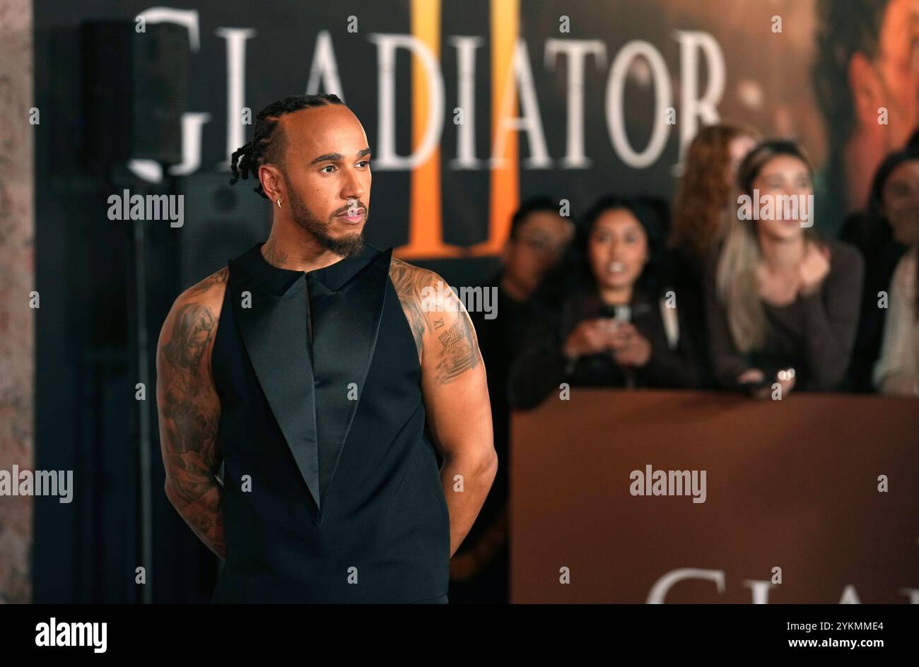 Race car driver Lewis Hamilton poses at the premiere of the film