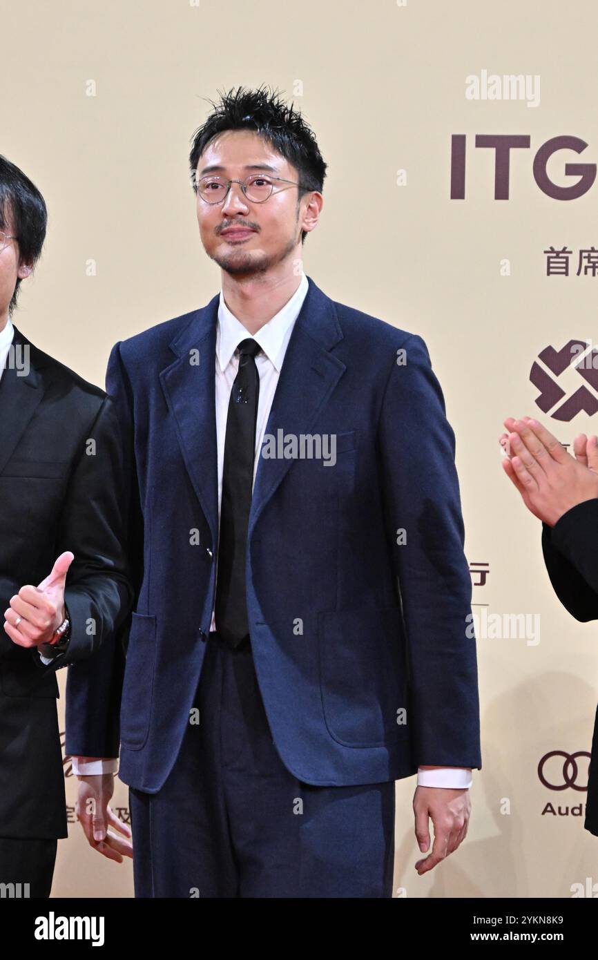 Chinese actor and host Eric Wang poses on the red carpet of the closing ...