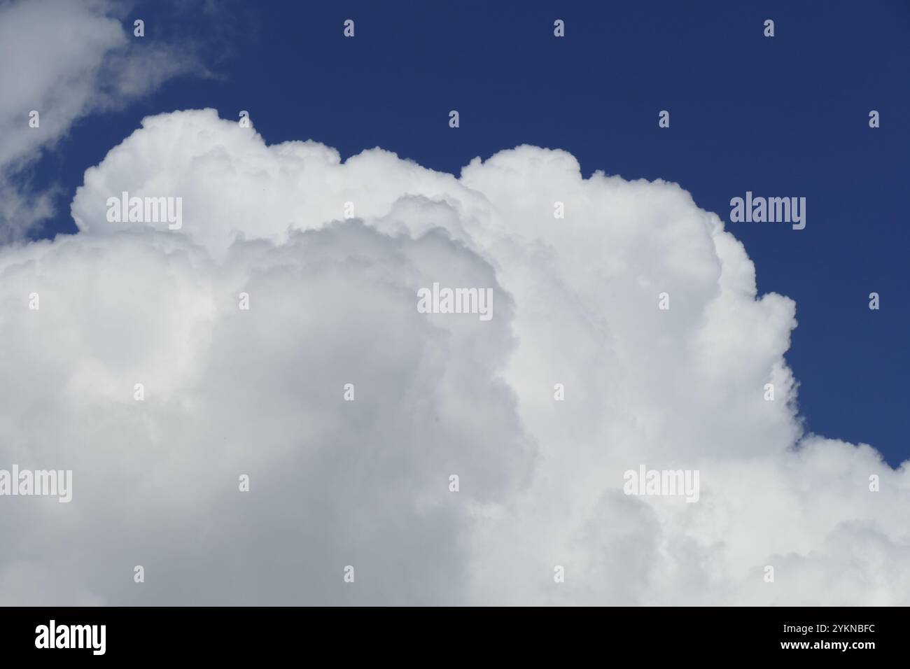 White spring clouds, blue sky, Germany Stock Photo