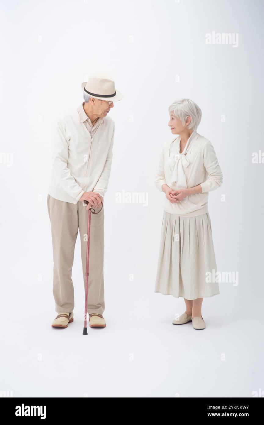 Man woman walking stick senior hi-res stock photography and images - Alamy