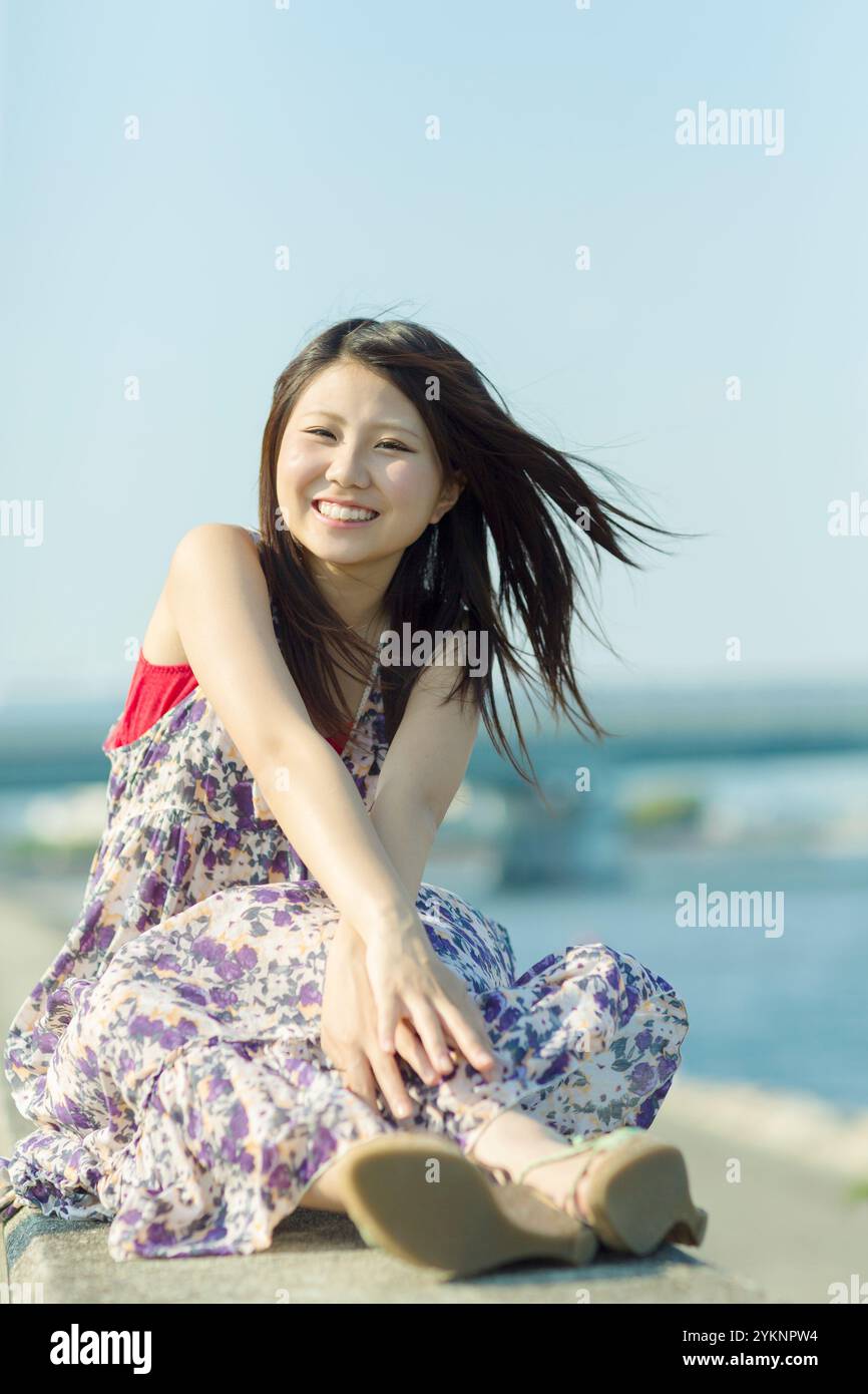 Woman sitting on piece hi-res stock photography and images - Alamy