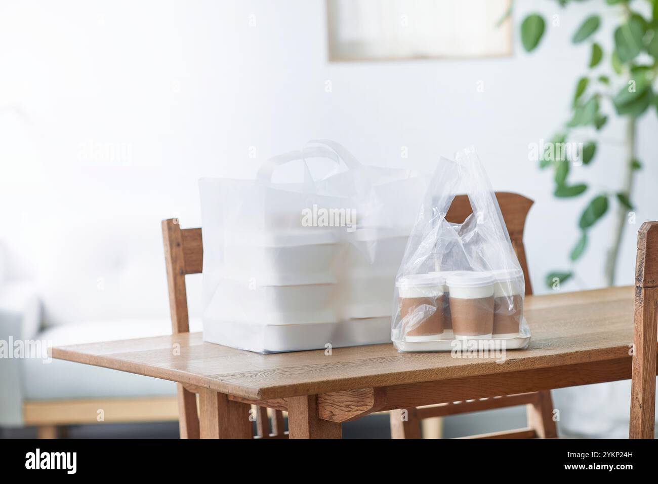 Food delivery meal on dining table Stock Photo