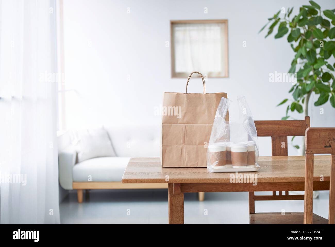 Food delivery meal on dining table Stock Photo