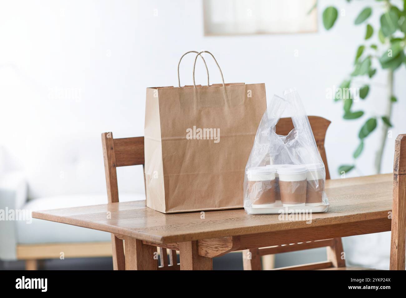Food delivery meal on dining table Stock Photo