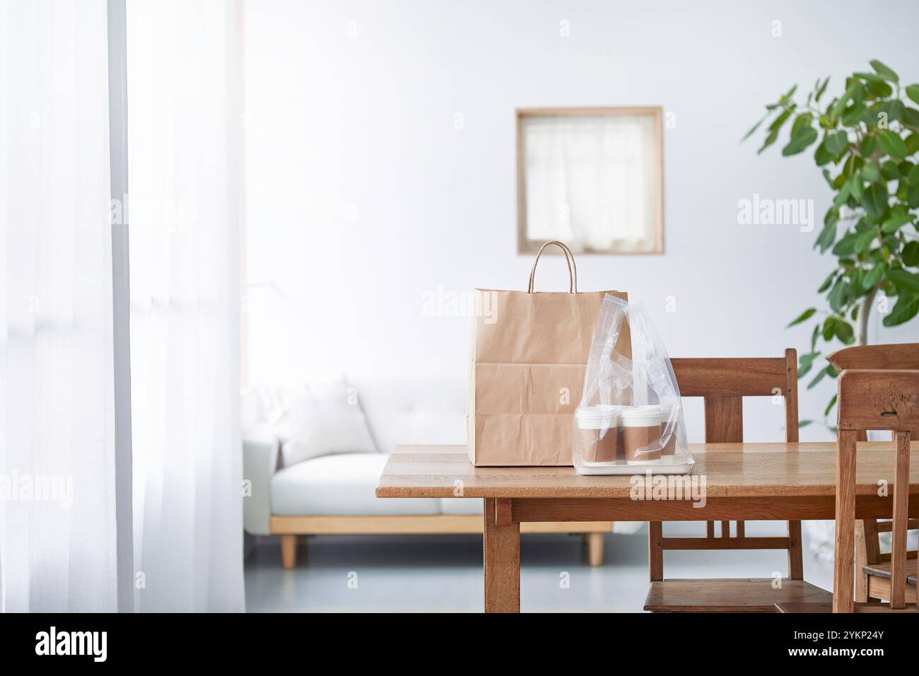 Food delivery meal on dining table Stock Photo