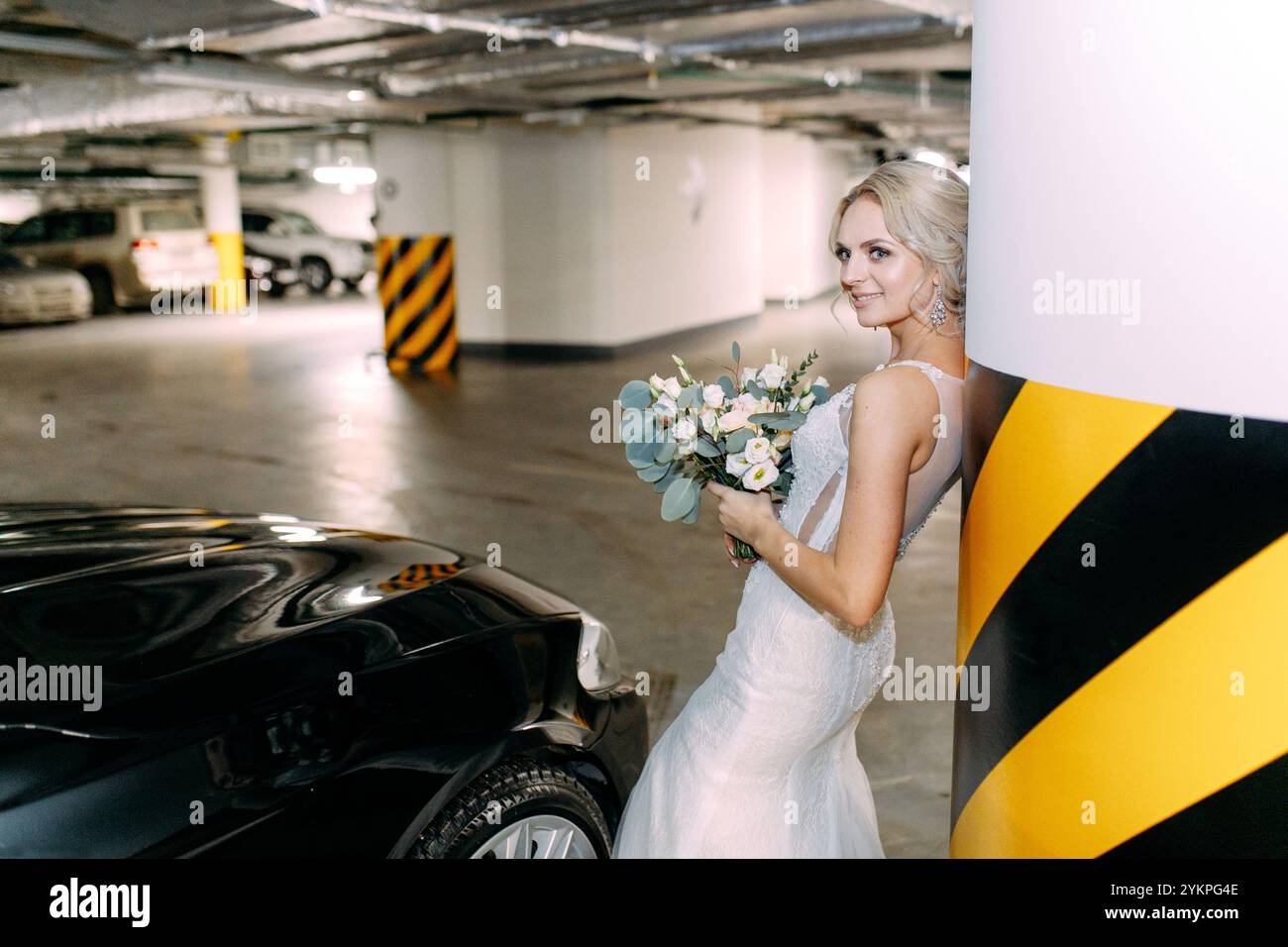 Beautiful bride poses in hi-res stock photography and images - Alamy