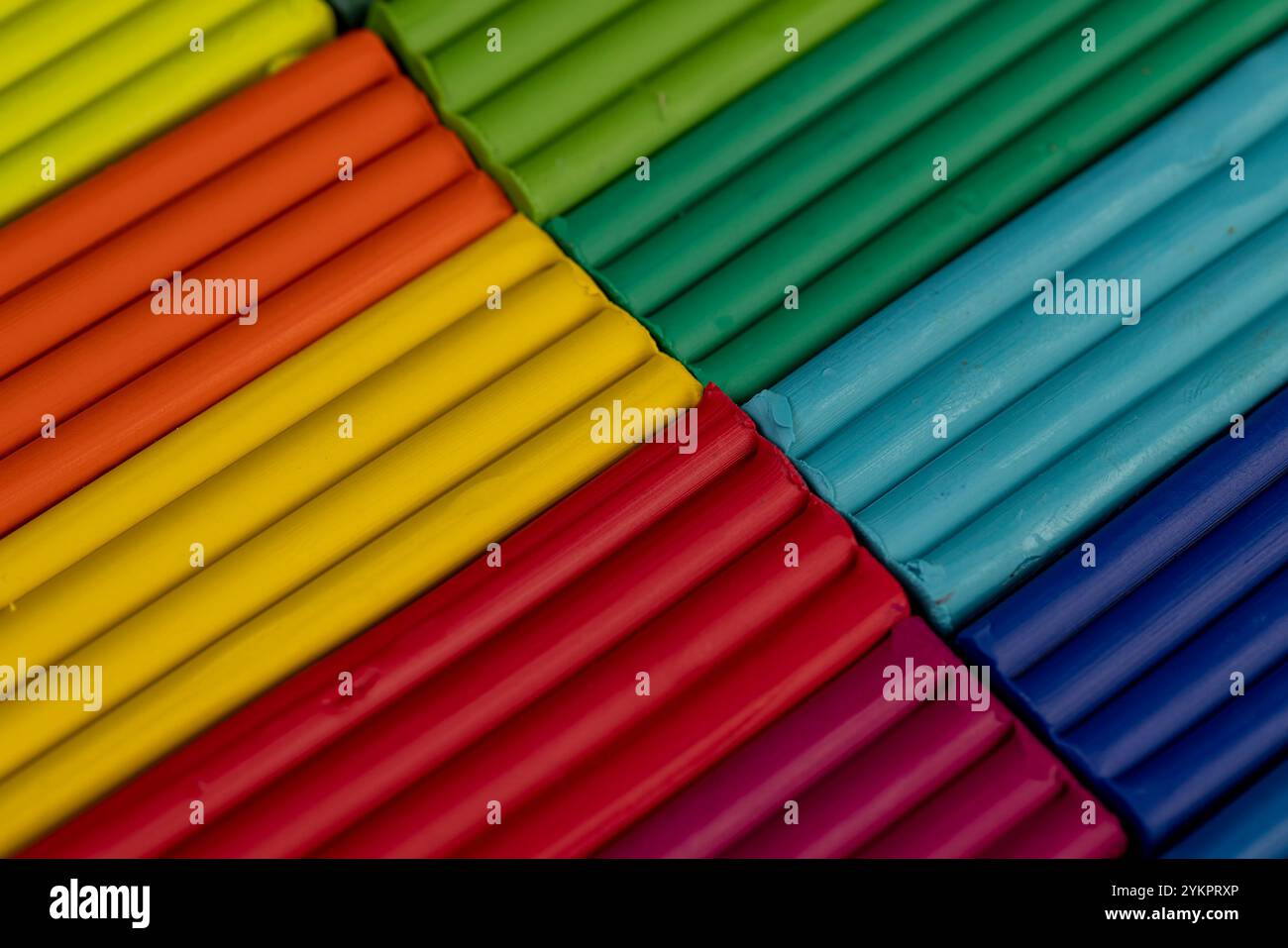 plasticine of different colors for modeling closeup, a simple colored plasticine that is used in creativity Stock Photo