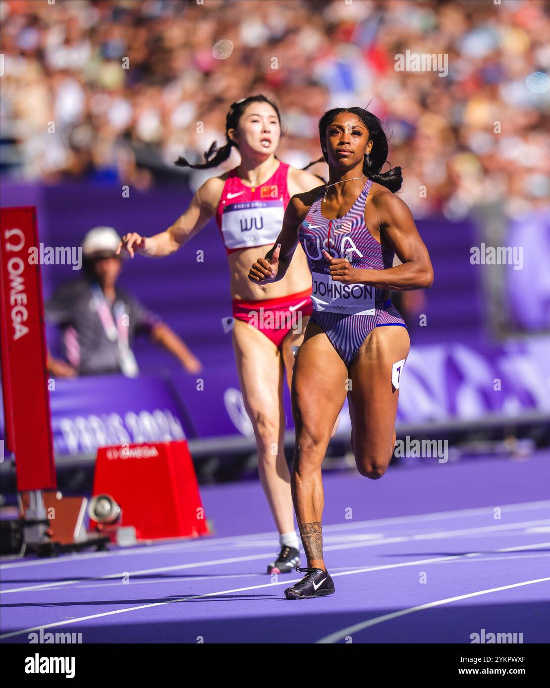 Alaysha Alaysha Johnson participating in the 100 meters hurdles at the Paris ...