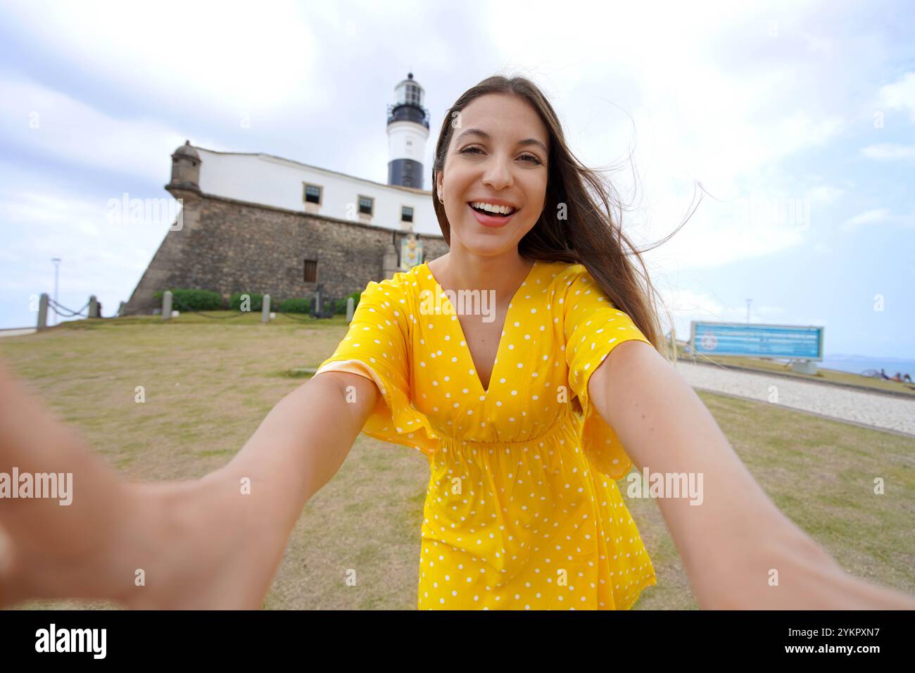 Self portrait of beautiful smiling girl in Salvador de Bahia seafront ...