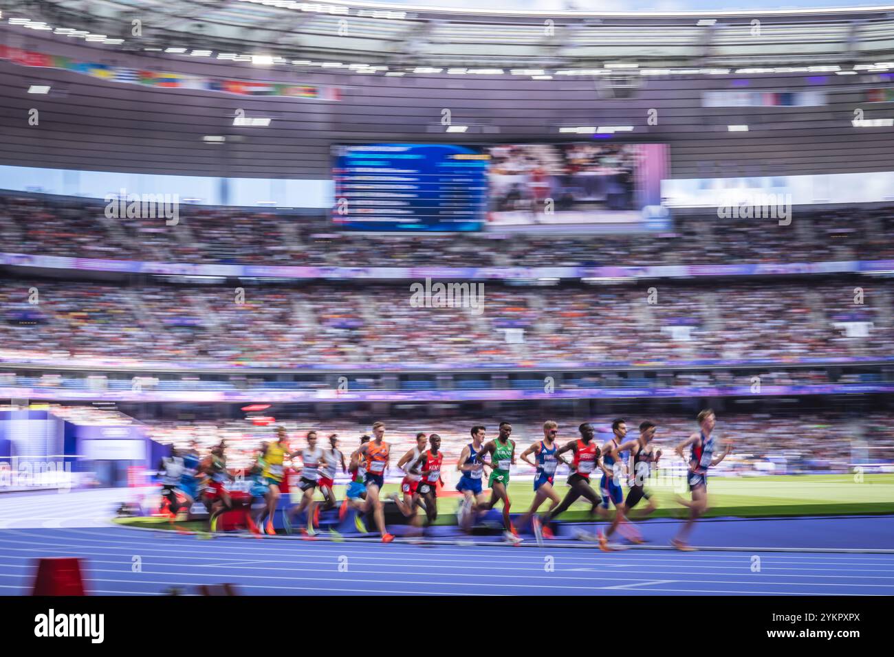 Image of Runners in motion in the 5000 meters at the Paris 2024 Olympic ...