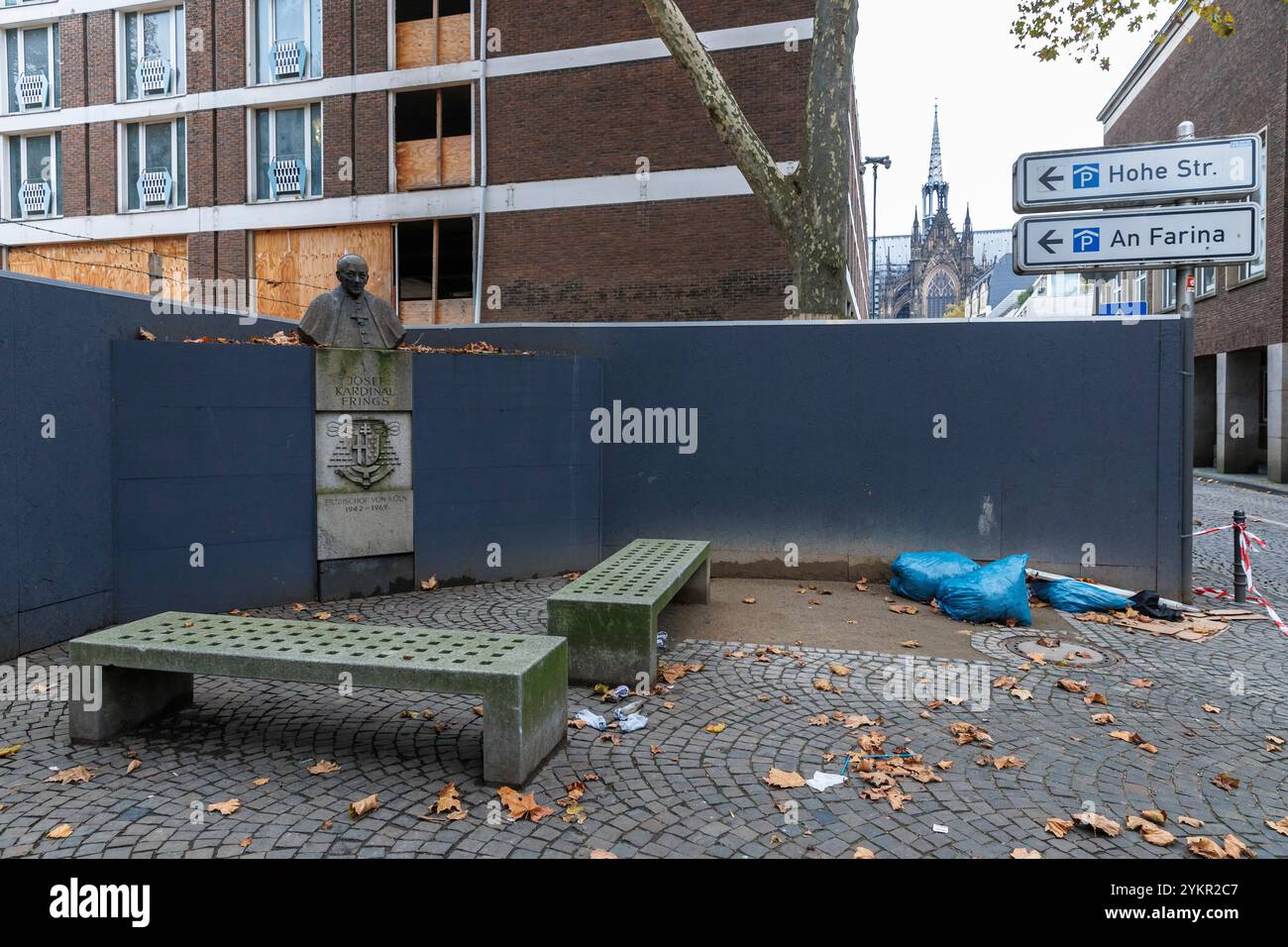 monument for Josef Kardinal Frings, Archbishop of Cologne from 1942 to 1969 on the Laurenz square, temporarily enclosed by a construction fence, Colog Stock Photo