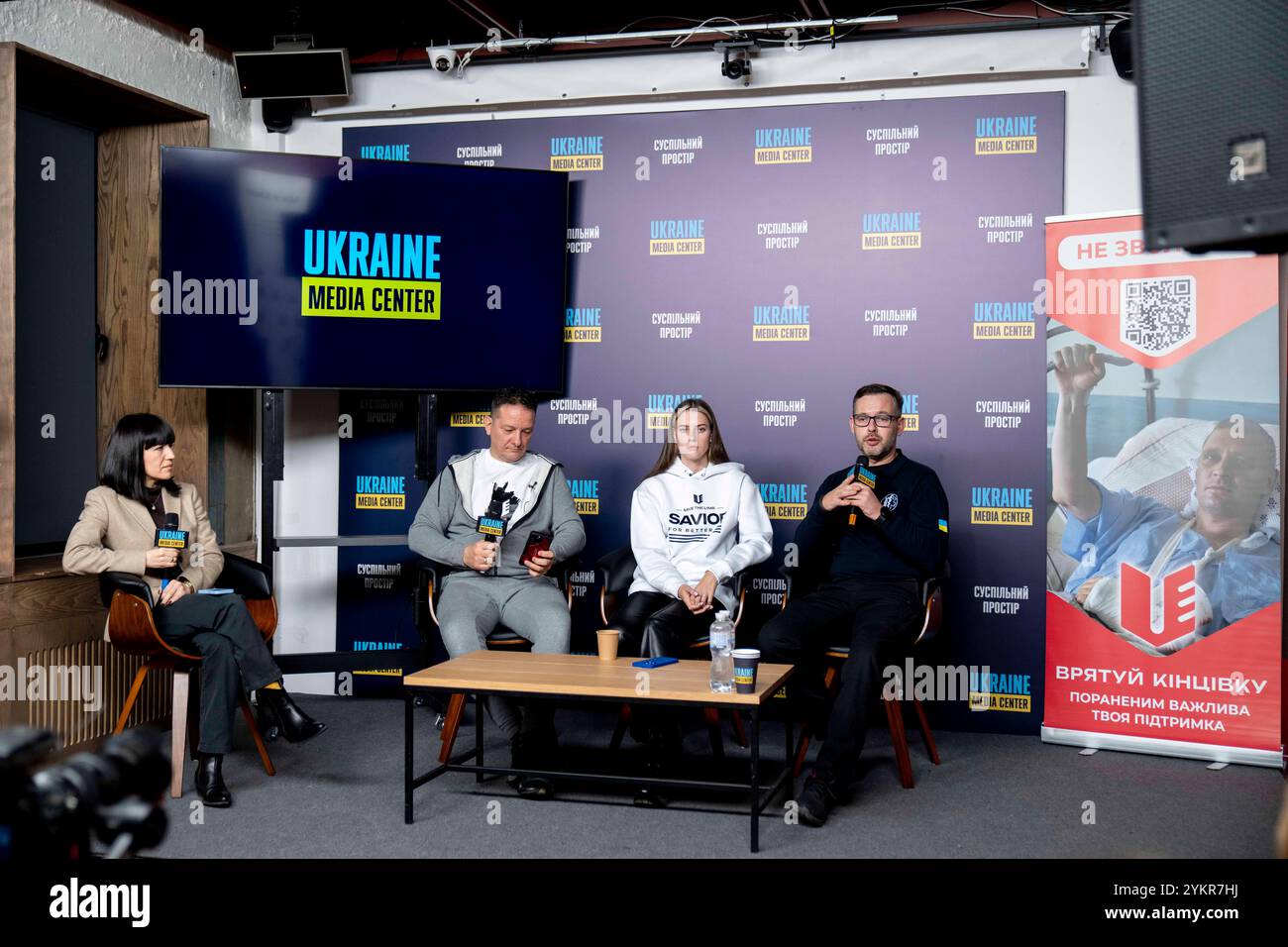 (From left to right) SERHIY SOSHYNSKYI, President of the International Charitable Foundation “Health of the Ukrainian People,” MBA in Healthcare Administration, YAROSLAVA MAHUCHIKH, Ukrainian high-jump athlete, Olympic champion and world record holder and LEONID FEDOROVSKYI, Chairman of the Board of the Association of First Aid and Tactical Medicine Operators and Instructors seen at press conference of the ambassadors of the Save a Limb program and representatives of international foundations and NGOs at the Ukraine Media Center. Stock Photo