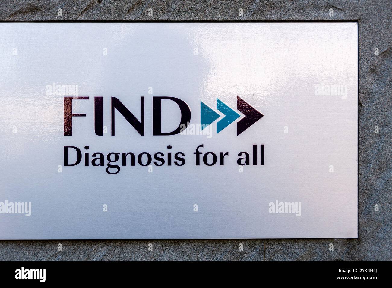 Sign and logo at the entrance to the headquarters of FIND (Foundation for Innovative New Diagnostics), Geneva, Switzerland Stock Photo