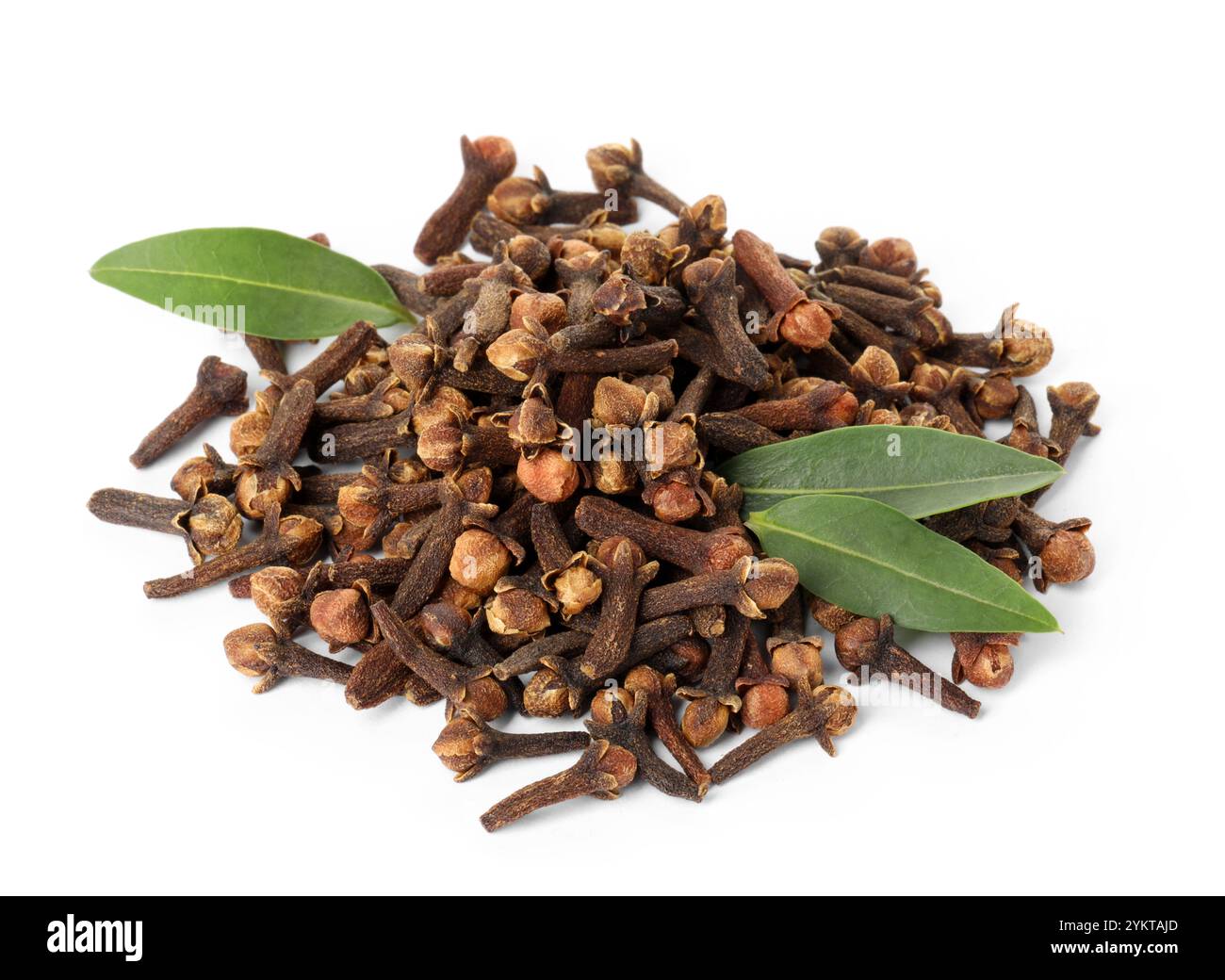 Pile of dry clove buds and green leaves on white background. Aromatic ...