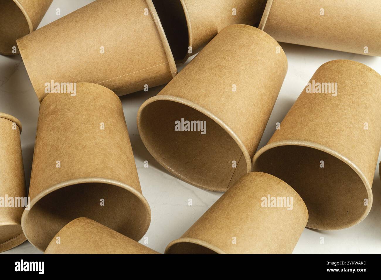 Many brown disposable empty paper cups. Containers for beverage Stock Photo