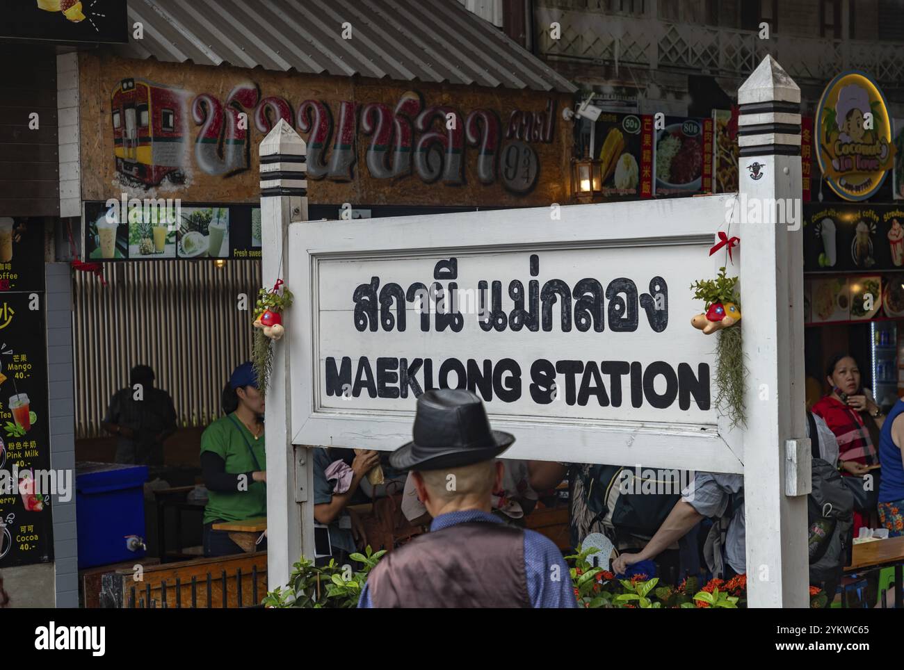 A picture of the sign at the Maeklong Railway Station, know for its train running close to the market Stock Photo