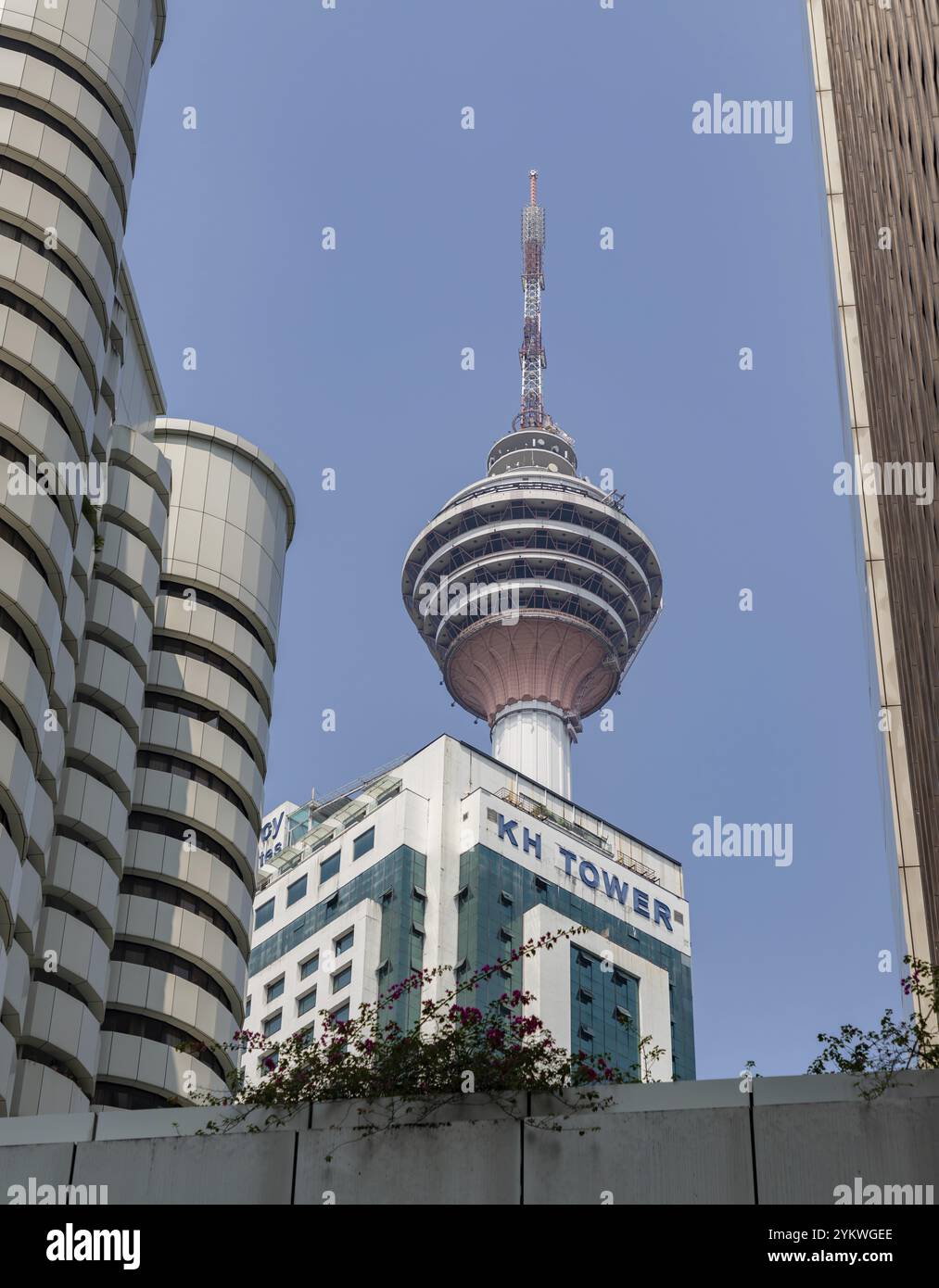 A picture of the upper section of the Menara Kuala Lumpur Tower rising ...