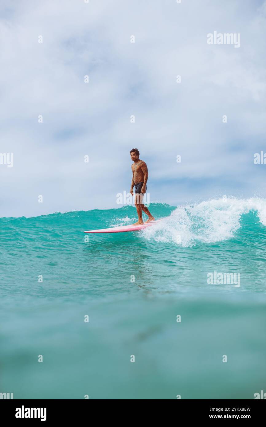 Surfer rides ocean wave on hi-res stock photography and images - Alamy