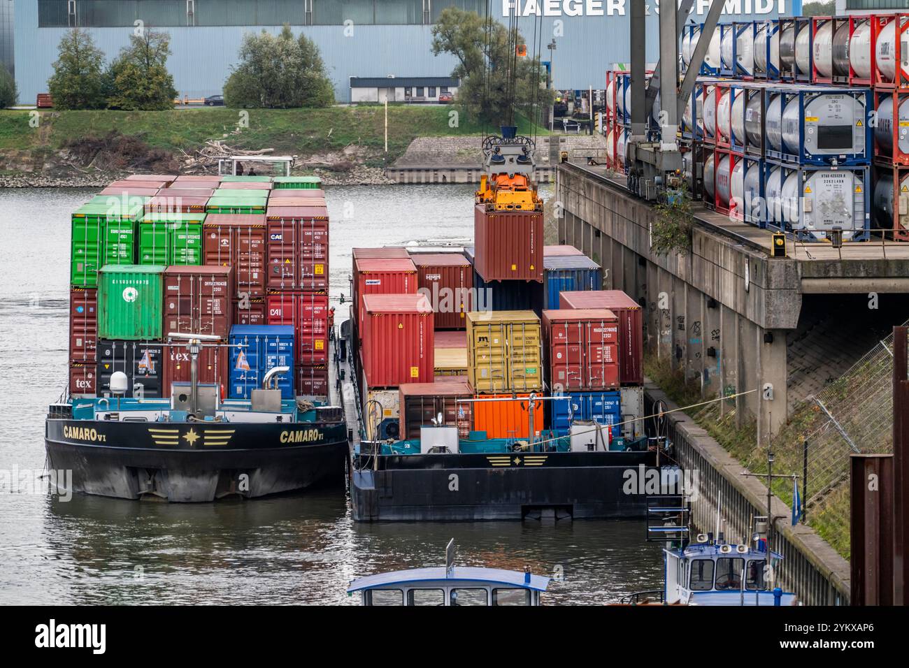 Port of Duisburg Ruhrort, Container freighter being loaded and unloaded ...
