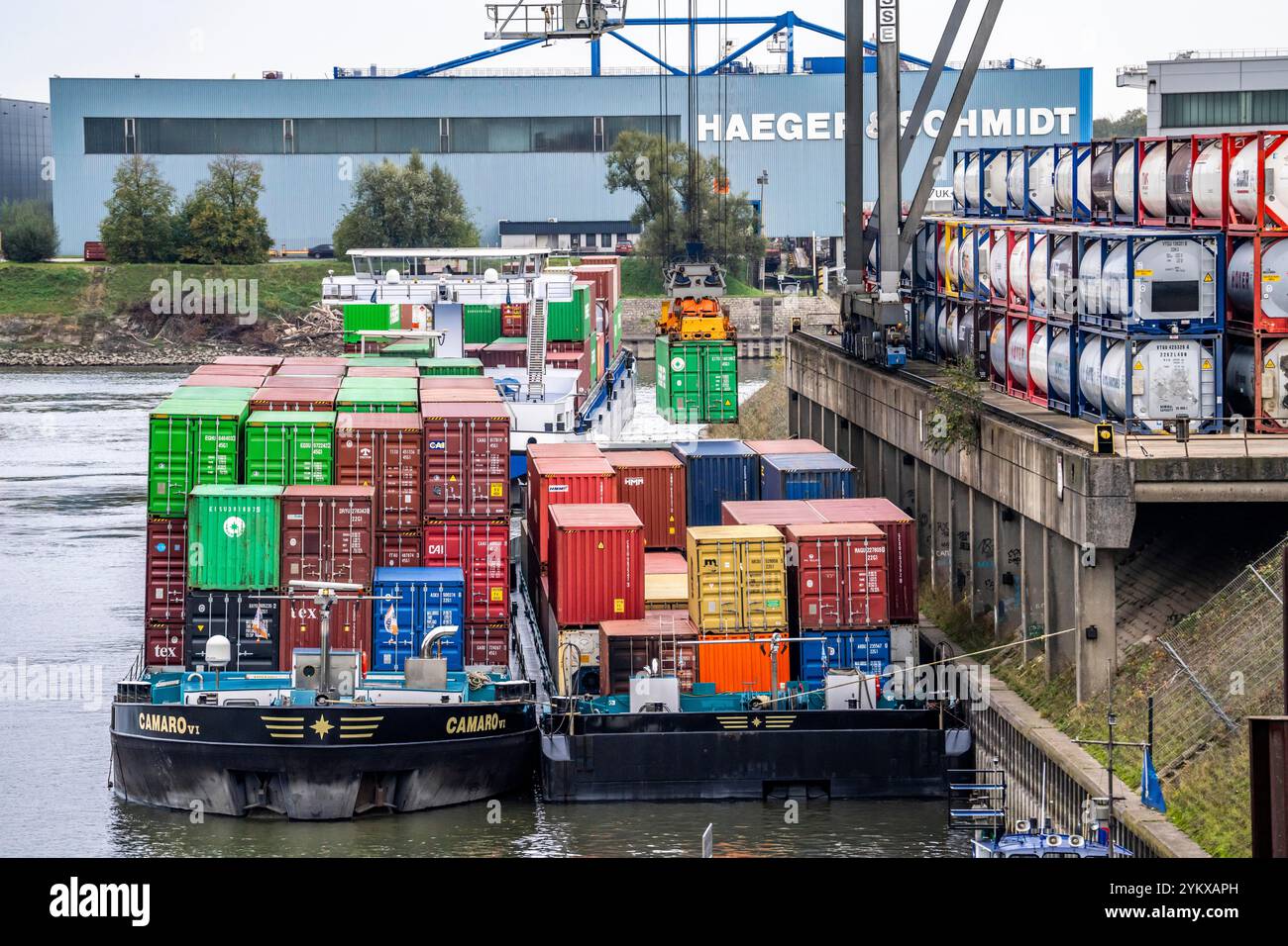 Port of Duisburg Ruhrort, Container freighter being loaded and unloaded ...
