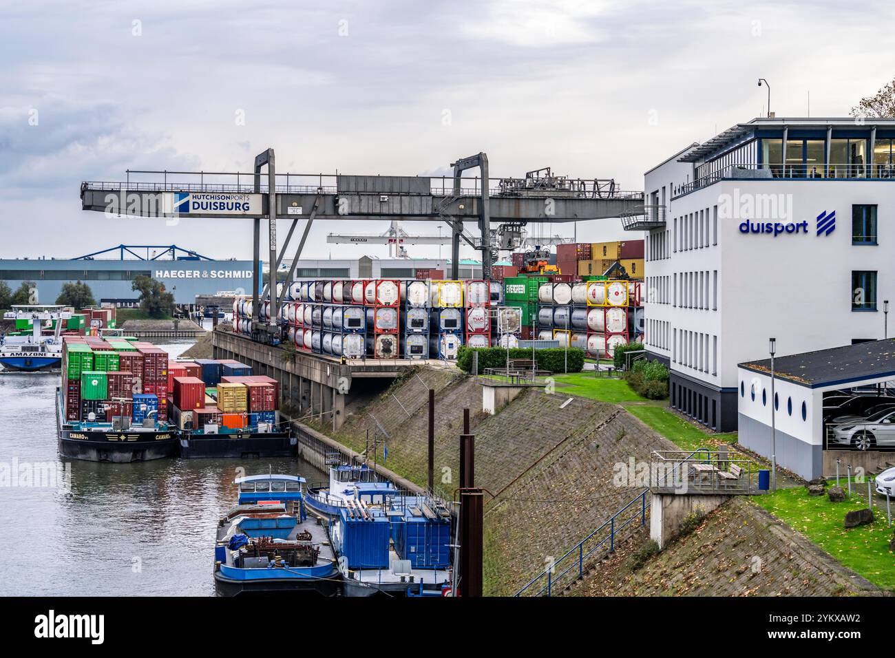 Port of Duisburg Ruhrort, container freighter being loaded and unloaded ...