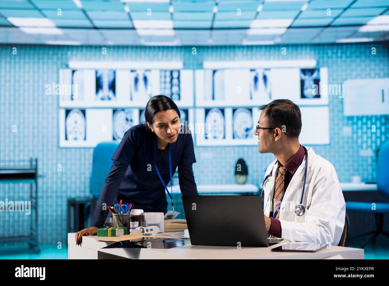 Physician meeting with a patient to discuss medical test results in a ...
