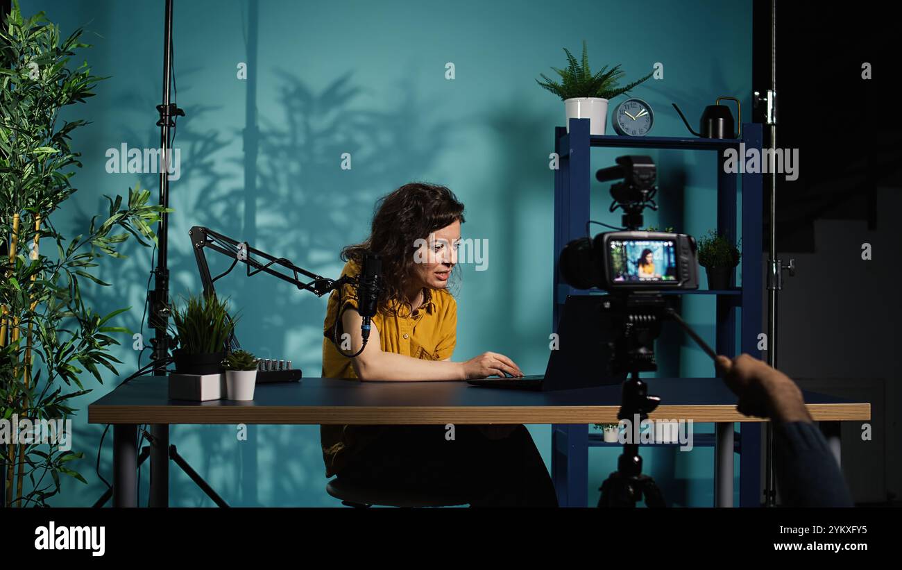 Content creator using production camera gear to film motivational type ...