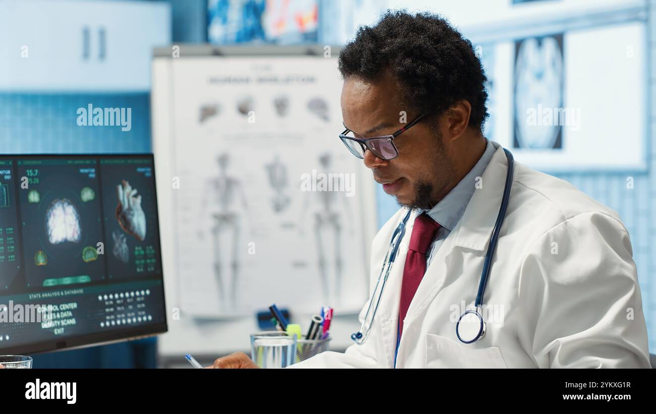 Professional medic analyzing x ray imaging and test findings in office ...