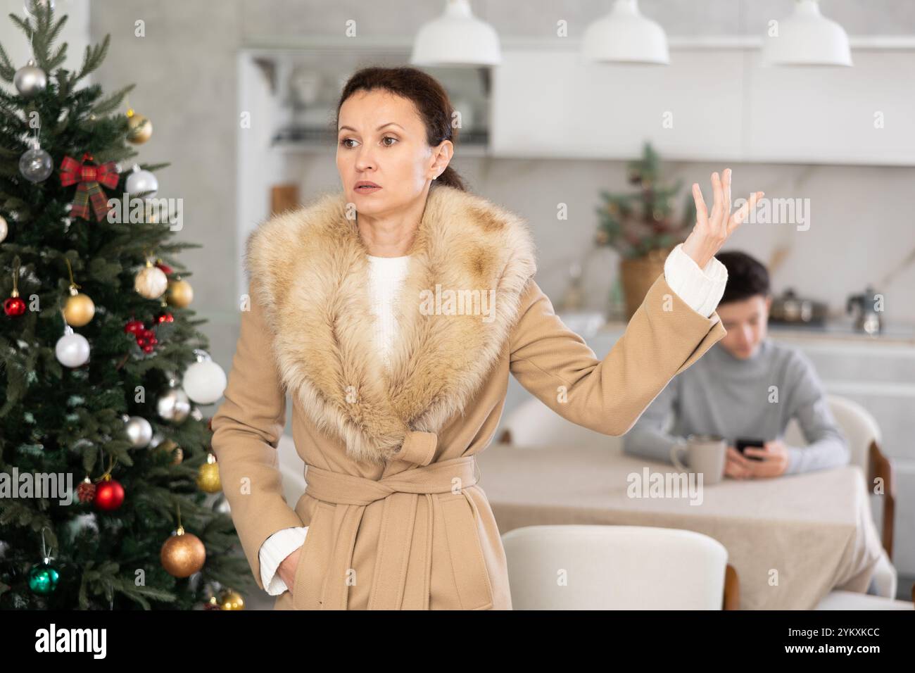Mother leaving son home alone Stock Photo - Alamy