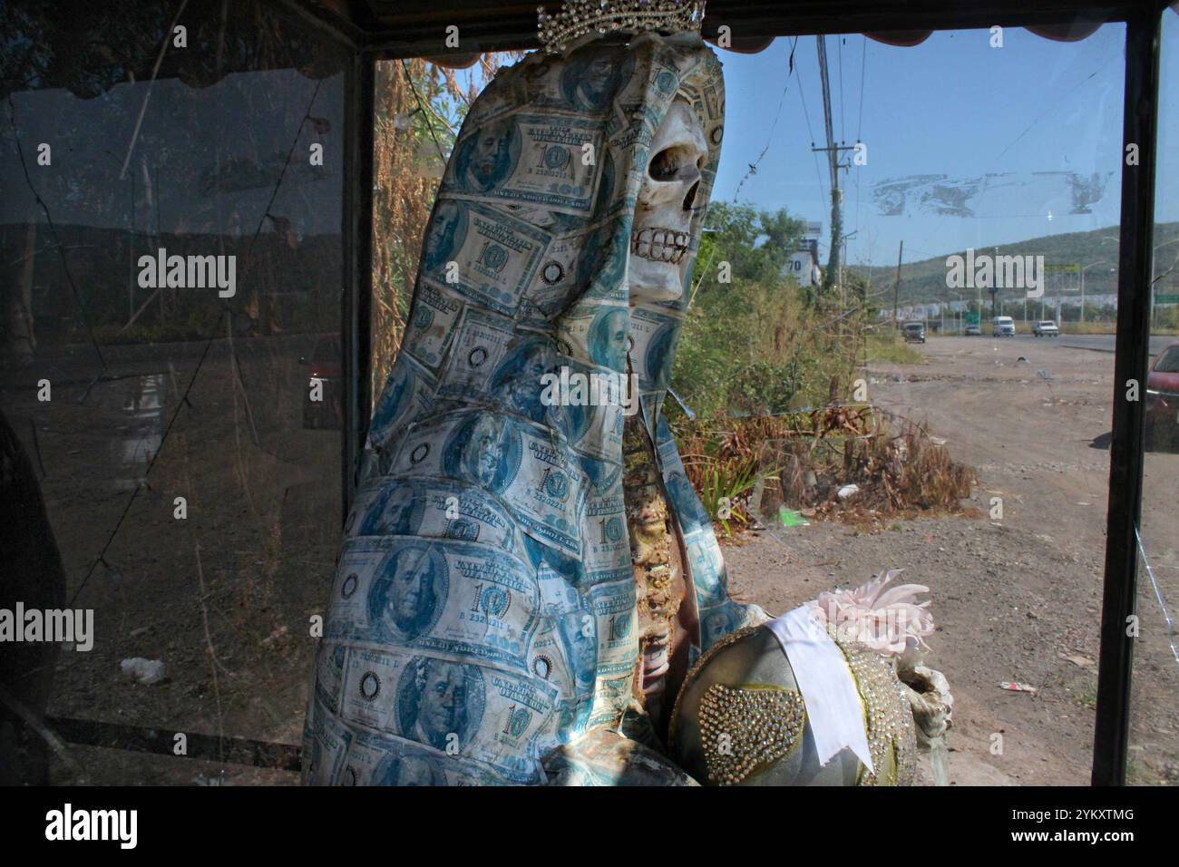 Culiacan, Sinaloa, Mexico. , . Mexico is a catholic country, but in the narco sphere, several narco saints are held in high esteem: Santa Muerte, the Holy Death and Jesus Malverde, a benevolent bandit who obtained Robin Hood cult status after being executed by the authorities. On many placed scattered throughout the city, chapels for Santa Muerte are erected as well (Photo by Teun Voeten/Sipa USA) Credit: Sipa USA/Alamy Live News Stock Photo