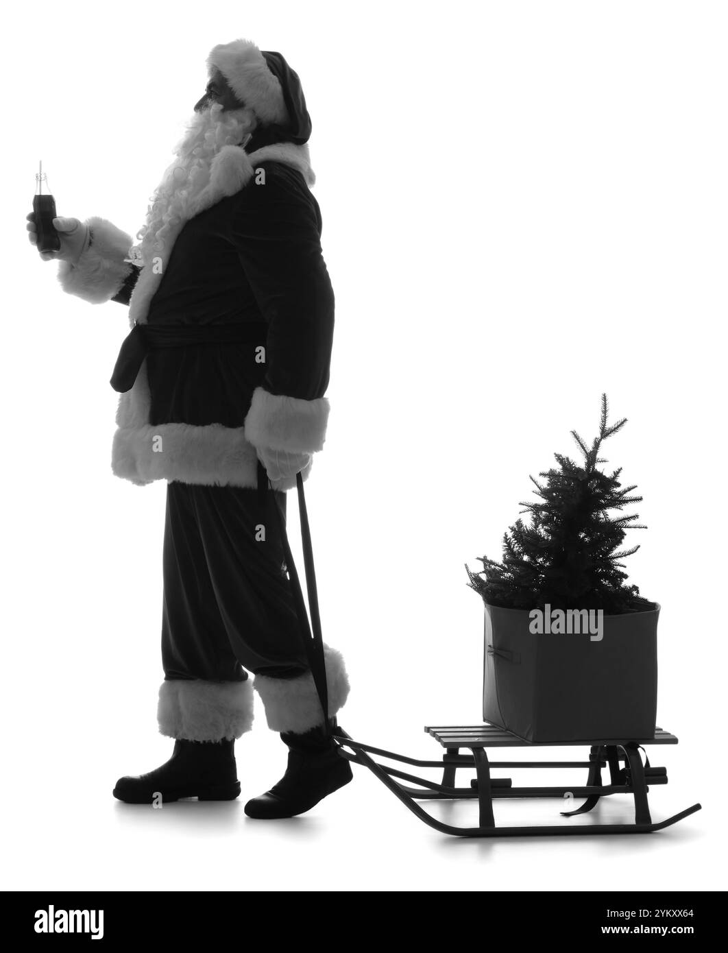 Silhouette of Santa Claus with cola and Christmas tree on sled against ...