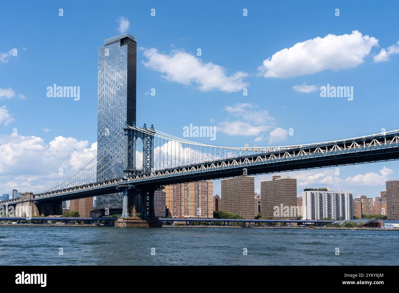 Manhattan Bridge with buildings in background in New York City, NY, USA. Stock Photo
