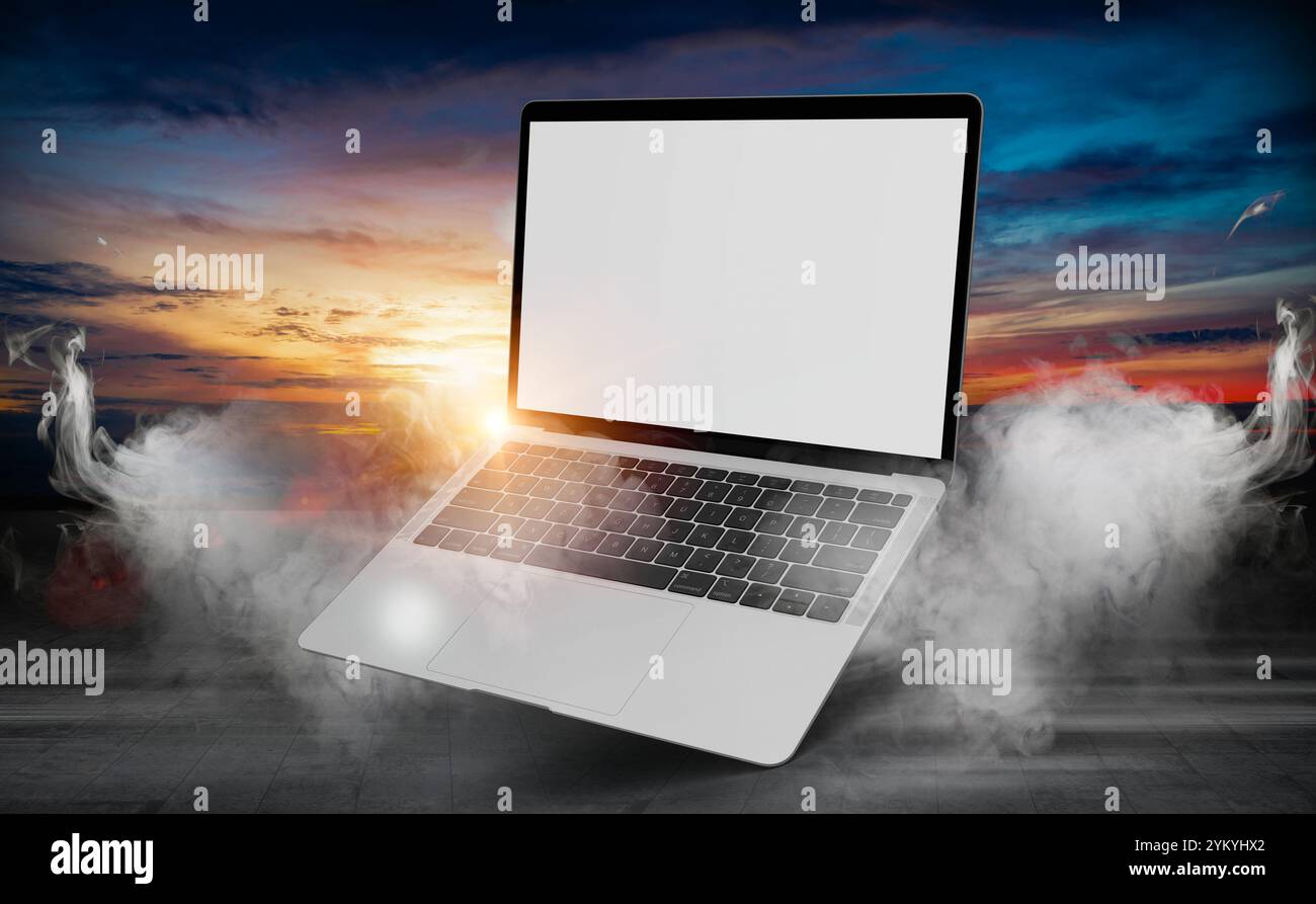 Laptop with blank empty white screen display mock up on a dark background Dramatic smoke or fog effect .Abstract smoke Product showcase with spotlight Stock Photo