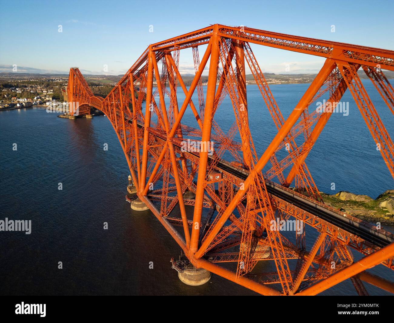 Aerial view from drone of the Forth Bridge (rail bridge) crossing Firth of Forth at North Queensferry, Fife , Scotland UK Stock Photo