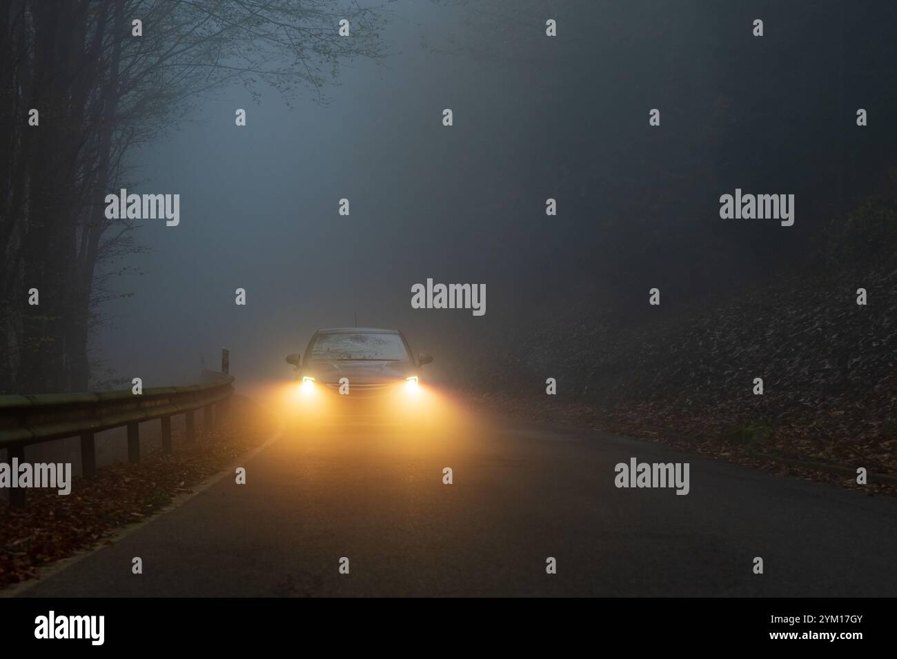 Car glowing headlights drives hi-res stock photography and images - Alamy