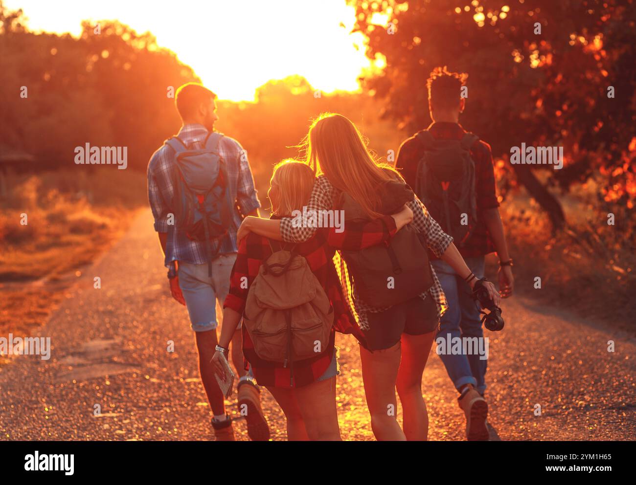 Group four hikers walking through hi-res stock photography and images ...