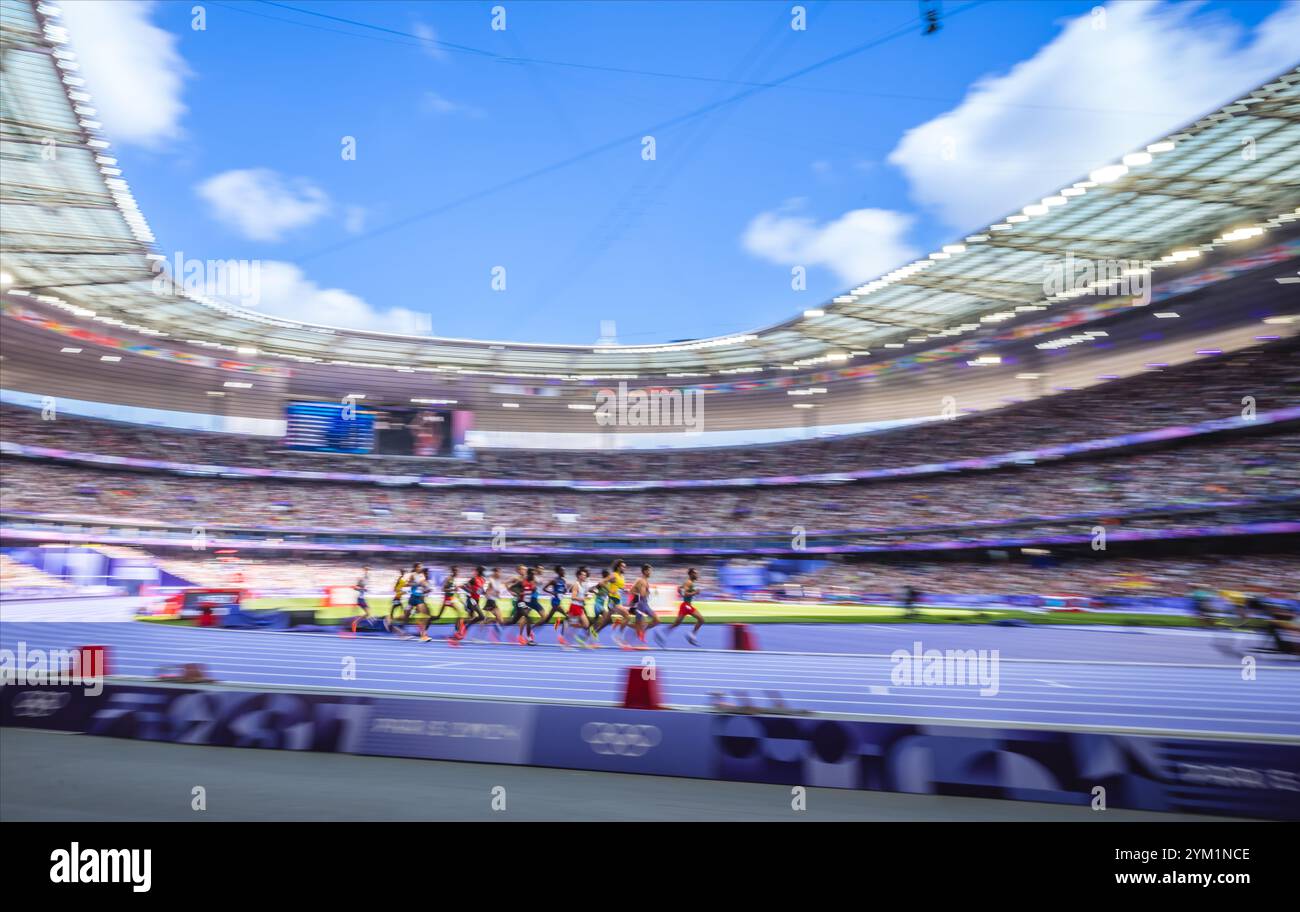 Image of Runners in motion in the 5000 meters at the Paris 2024 Olympic ...