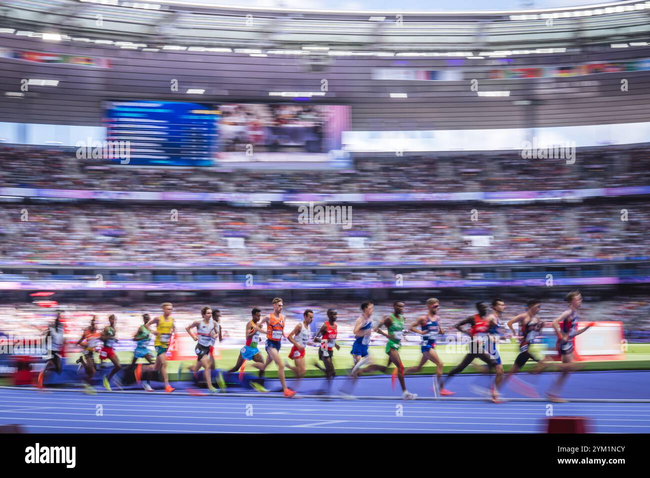 Image of Runners in motion in the 5000 meters at the Paris 2024 Olympic ...
