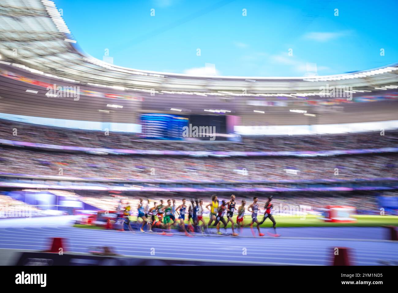 Image of Runners in motion in the 5000 meters at the Paris 2024 Olympic ...