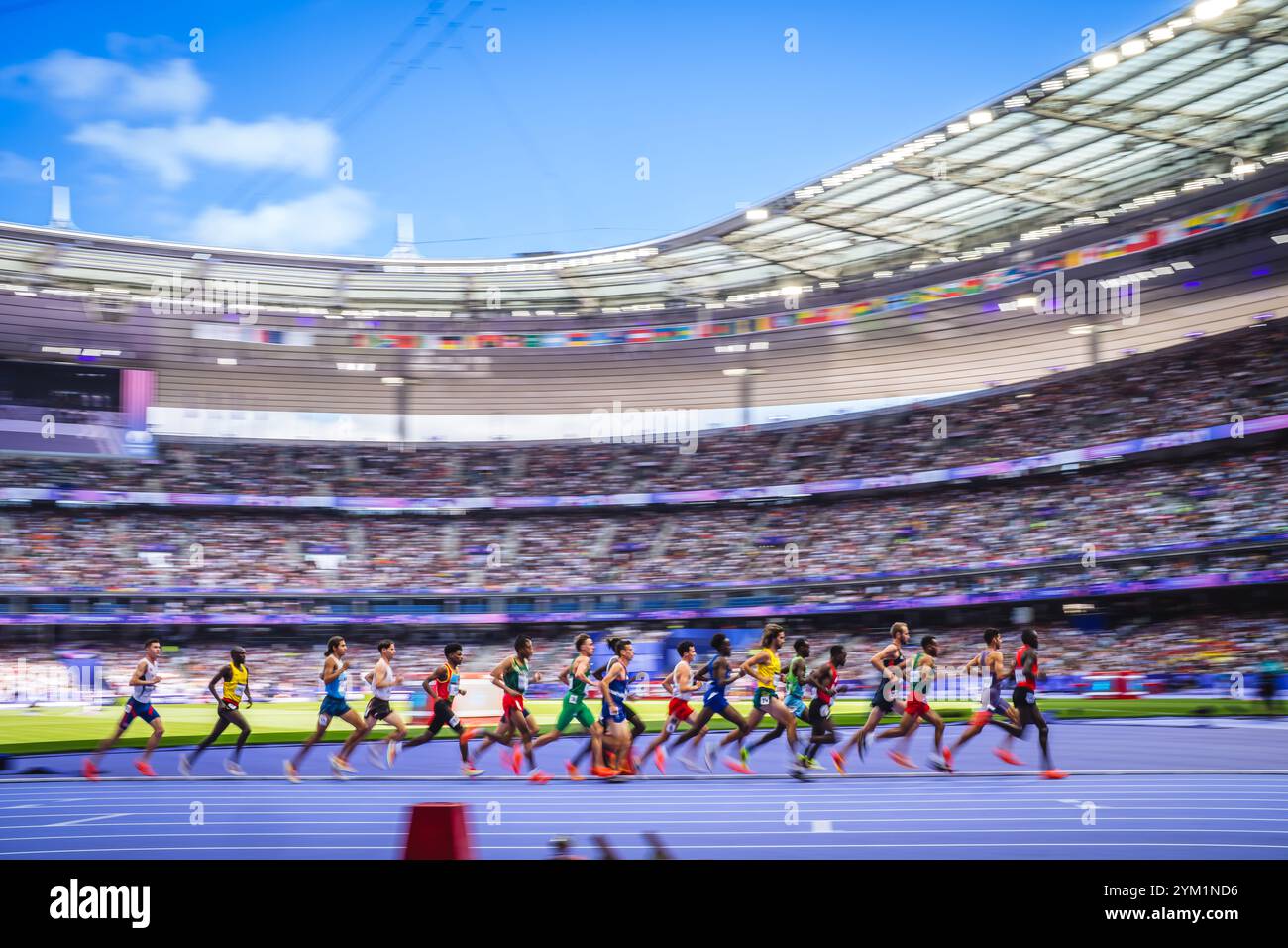 Image of Runners in motion in the 5000 meters at the Paris 2024 Olympic ...