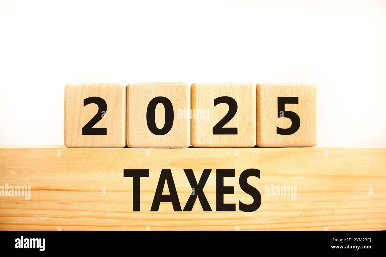 Planning 2025 taxes new year symbol. Concept words 2025 Taxes on beautiful wooden blocks