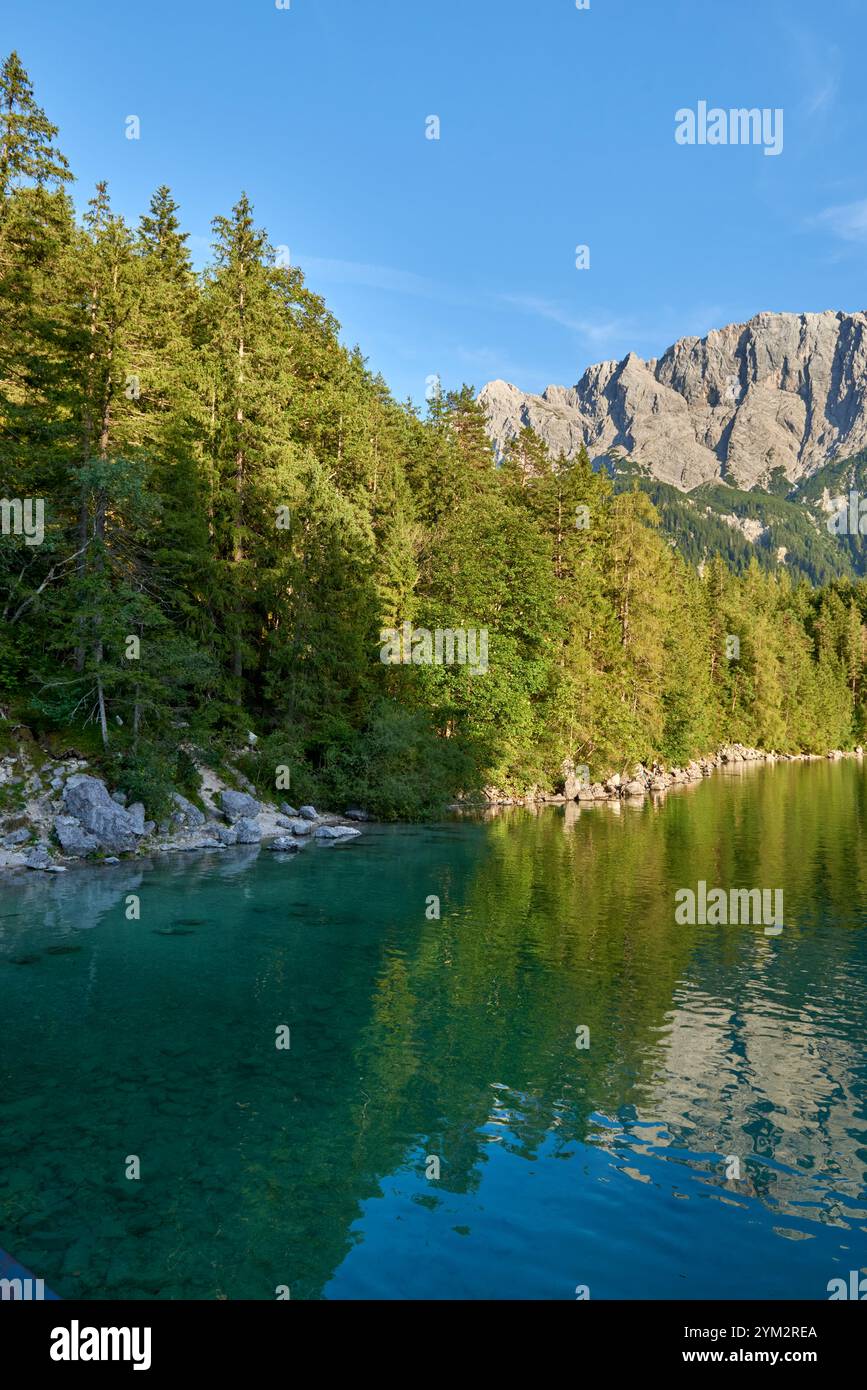 Scenic View of Eibsee Lake with Zugspitze Mountain at Sunset in Bavaria ...