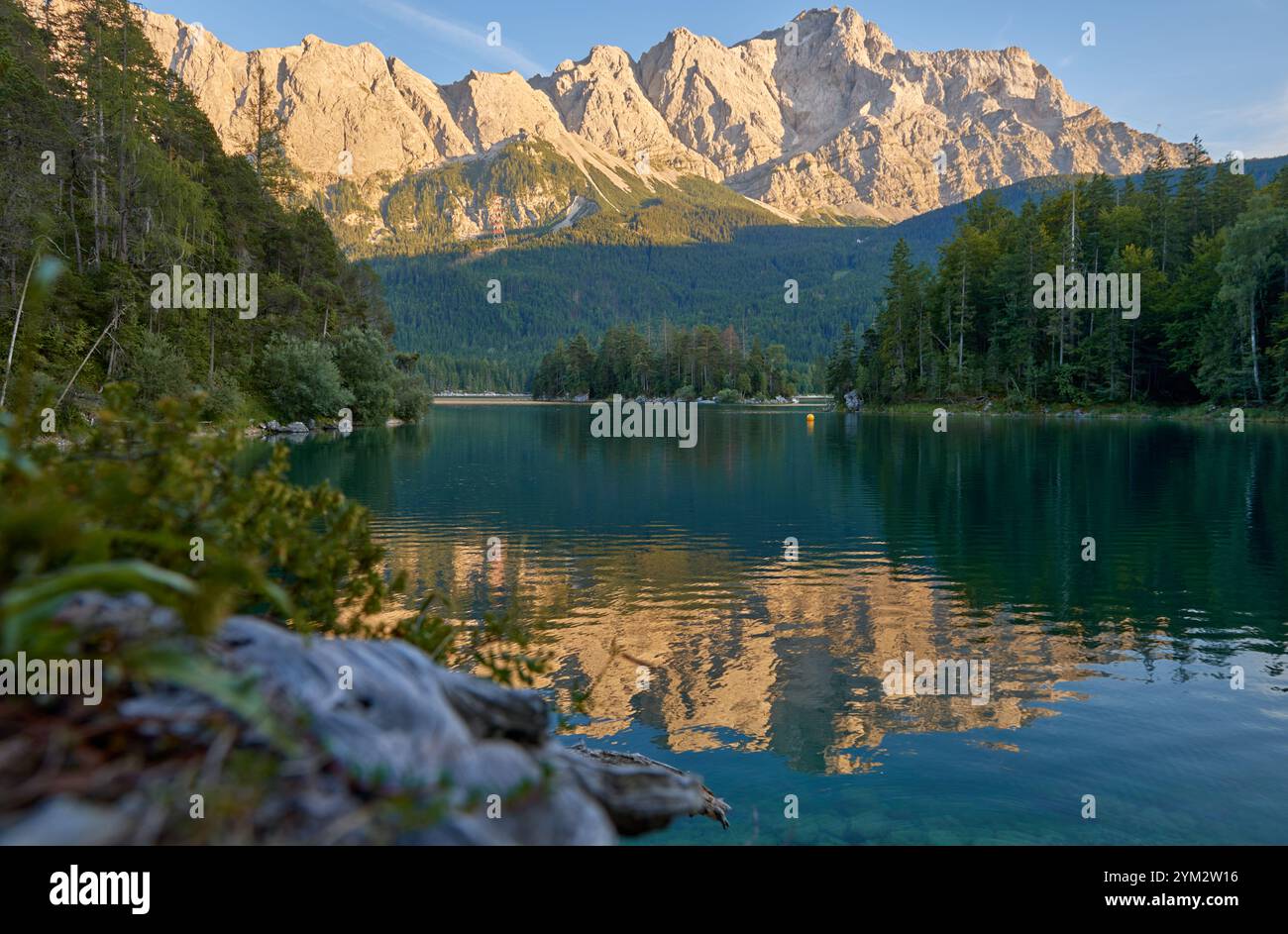 Scenic View of Eibsee Lake with Zugspitze Mountain at Sunset in Bavaria ...