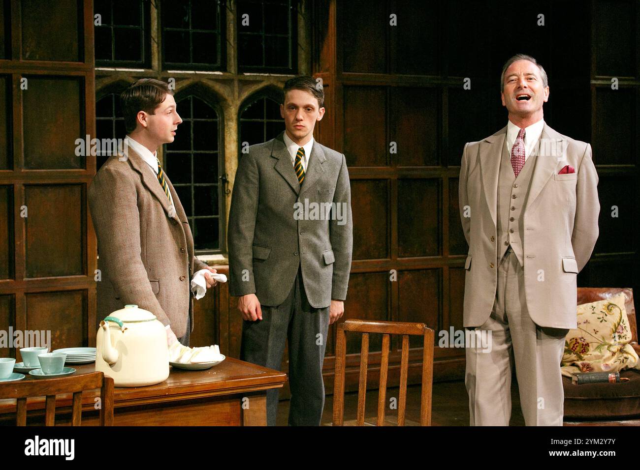 II/ii - l-r: James Parris (Menzies) , Mark Donald (Devenish), Julian Wadham (Vaughan Cunningham) in ANOTHER COUNTRY by Julian Mitchell at the Minerva Theatre, Chichester Festival Theatre, West Sussex, England   24/09/2013 design: Peter McKintosh   lighting: Paul Pyant   director: Jeremy Herrin Stock Photo