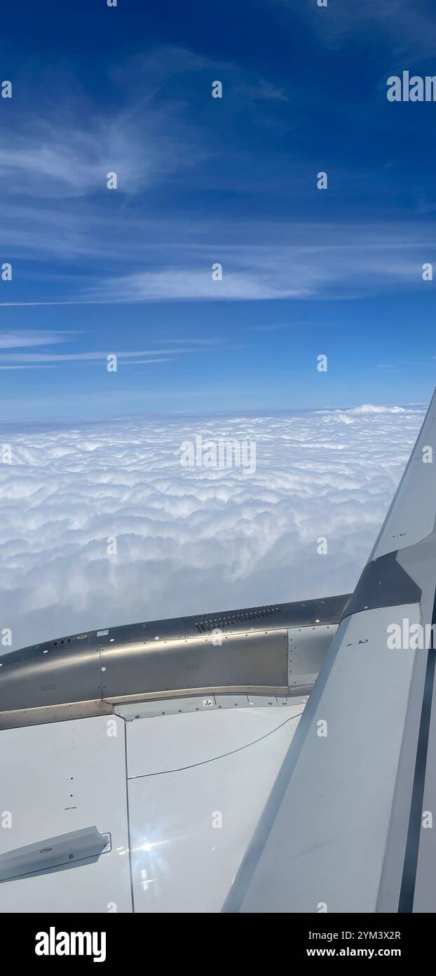 'Above the clouds, where the sky feels endless'. - Smartphone Captured Stock Image