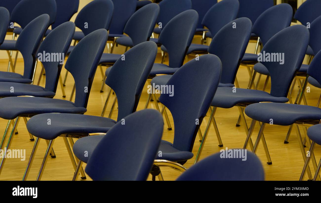Rows of chairs in acity hall. Stock Photo