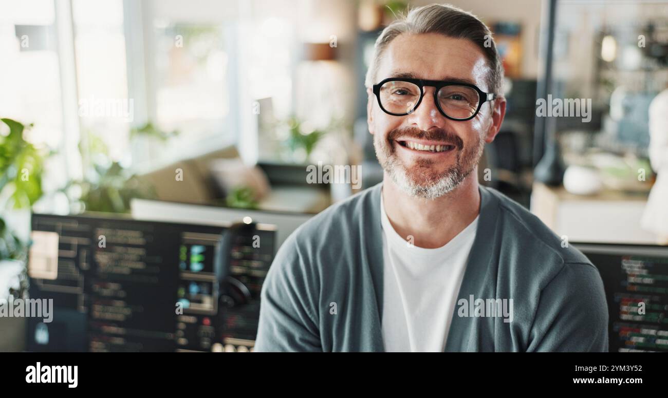 Man, programmer and glasses in agency for portrait, web development or software engineering on screen. Mature coder, happy or tech in office for Stock Photo