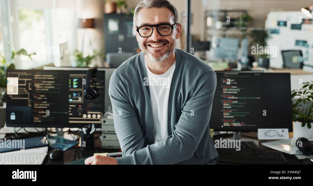 Man, programmer and glasses in office for portrait, web development or software engineering on screen. Mature coder, happy or tech in agency for Stock Photo