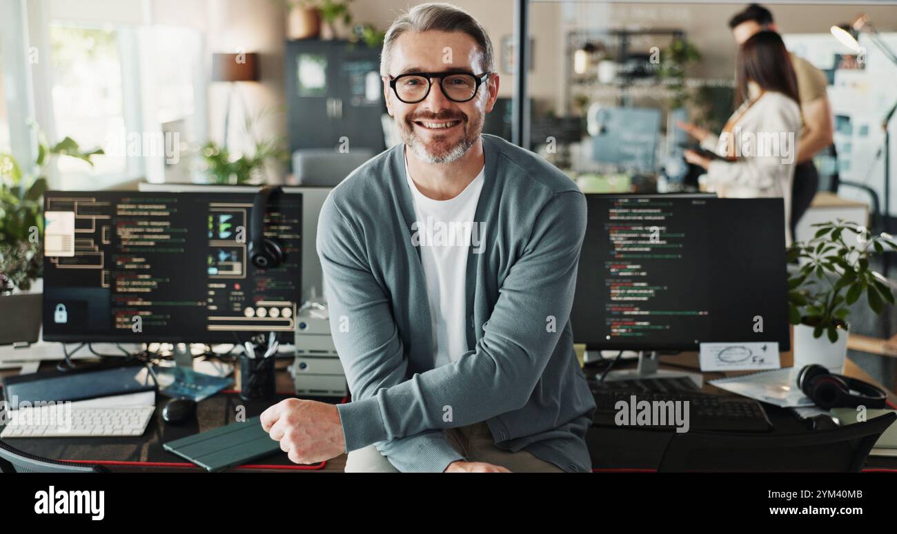 Happy man, coder and glasses in office for portrait, website development and software engineering on screen. Mature programmer, smile and computer in Stock Photo